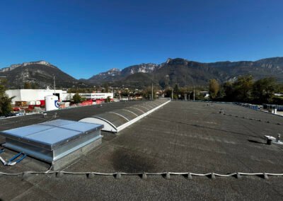 Rehausse coiffante sur exutoire de fumee